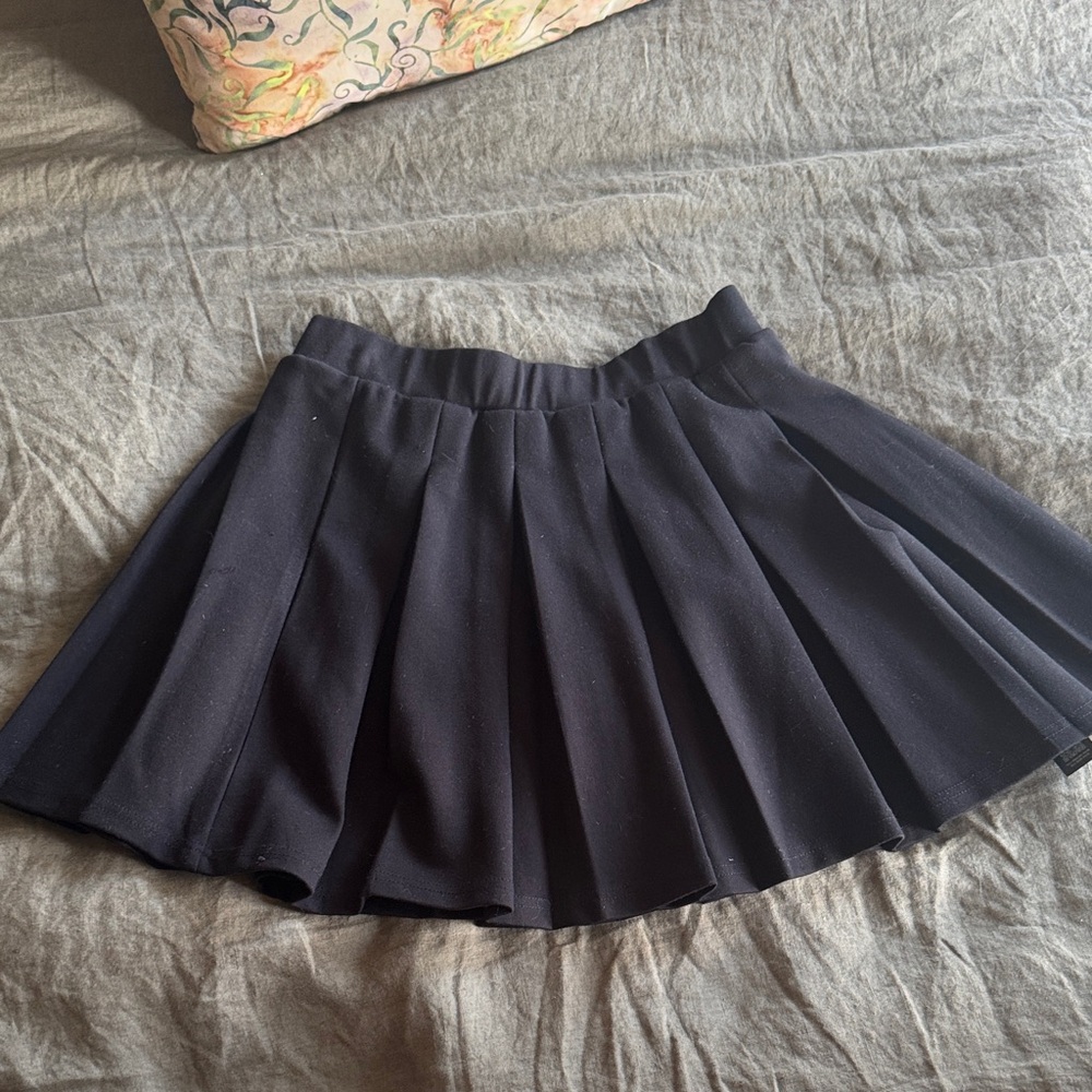 pleated mini skirt